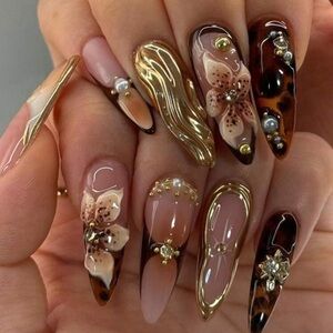 Elegant Floral Nail Art with Gold Accents